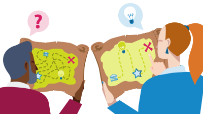 Two people holding maps